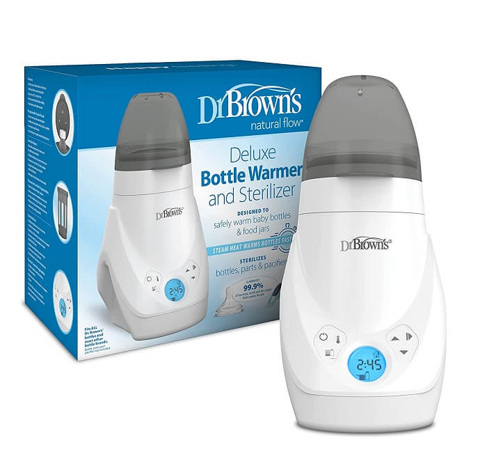 Dr. Brown's Deluxe Baby Bottle Warmer with a bottle in it, displaying the LCD control panel and the warm-up option.