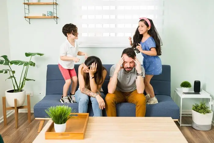 A parent seeking support from a support group or therapist, emphasizing the importance of reaching out and seeking help to prevent and address parental burnout.
